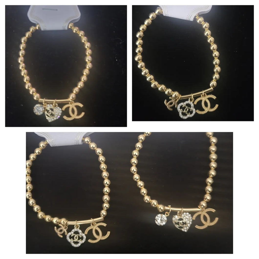 2 styles: Inspired CC beaded & rhinestone charm bracelets (heart shape & clover shape)