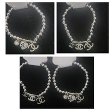 Load image into Gallery viewer, 2 styles: Inspired CC beaded &amp; rhinestone charm bracelets (heart shape &amp; clover shape)
