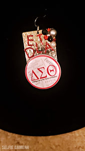 Custom made square Delta earrings_(the Delta novelty buttons are publicly purchased from a license greek-establishment)